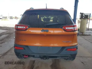2015 Jeep Cherokee Trailhawk z VIN 1C4PJMBS4FW647489, wystawiony jako Copart lot #53362135 z przebiegiem 53 139 mil mil oraz Szkoda całkowita • Salvage title. Historia ofert i sprzedaży dostępna na DreamBid. Obrazek 6.