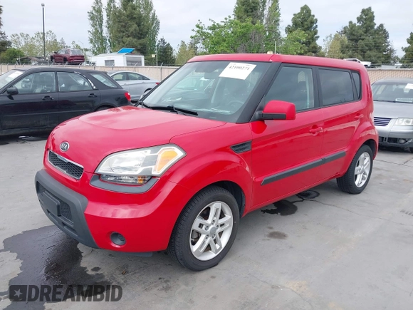 2011 Kia Soul + with VIN KNDJT2A23B7236403, listed as a IAAI auction lot 42100271 with 75,349 mi miles. Bid and sale history available at carsss.com. Image 2.