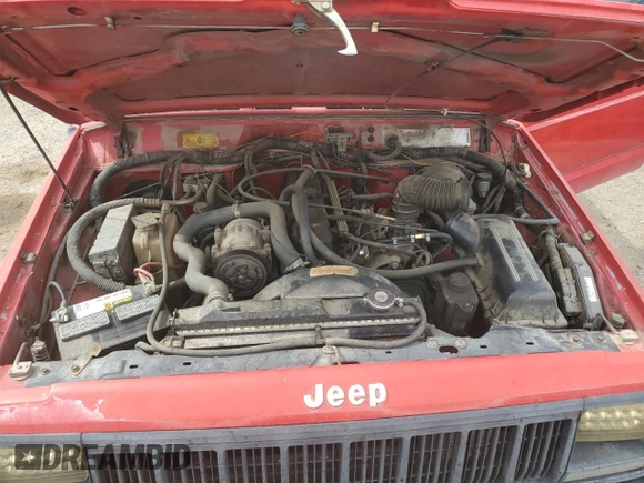 1993 Jeep Cherokee SE with VIN 1J4FT27P2PL619945, listed as a Copart auction lot 59053465 with 222,336 mi miles and Clean title. Bid and sale history available at DreamBid. Image 11.