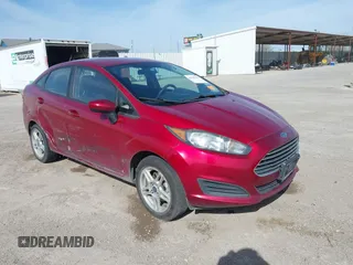 2017 Ford Fiesta SE z VIN 3FADP4BJ7HM126087, wystawiony jako IAAI lot #41825963 z przebiegiem 110 237 mil mil oraz . Historia ofert i sprzedaży dostępna na DreamBid. Obrazek 1.