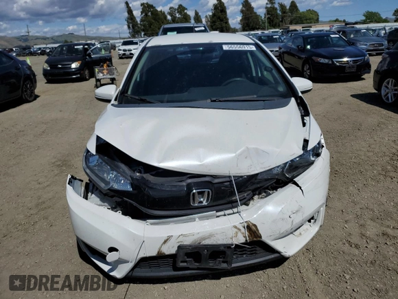 2015 Honda Fit LX with VIN 3HGGK5G55FM748175, listed as a Copart auction lot 56556915 with 98,858 mi miles and Salvage title. Bid and sale history available at DreamBid. Image 5.