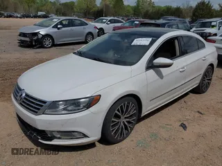 2014 Volkswagen CC Executive z VIN WVWGU7ANXEE507486, wystawiony jako IAAI lot #41943516 z przebiegiem 148 796 mil mil oraz . Historia ofert i sprzedaży dostępna na DreamBid. Obrazek 2.