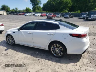 2016 Kia Optima SXL Turbo z VIN 5XXGV4L20GG121446, wystawiony jako Copart lot #57895125 z przebiegiem 131 889 mil mil oraz Czysty tytuł • Clean title. Historia ofert i sprzedaży dostępna na DreamBid. Obrazek 2.