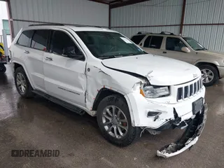 2016 Jeep Grand Cherokee Overland with VIN 1C4RJFCG0GC320217, listed as a IAAI auction lot 42112643 with 165,318 mi miles and . Bid and sale history available at DreamBid. Image 1.