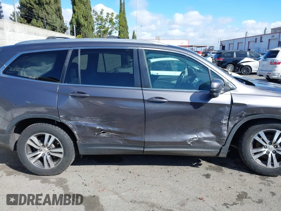 2017 Honda Pilot EX-L with VIN 5FNYF6H57HB021350, listed as a IAAI auction lot 41673635 with 101,980 mi miles and . Bid and sale history available at DreamBid. Image 13.