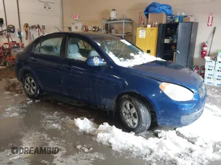 2006 Hyundai Accent GL z VIN KMHCN45C66U013891, wystawiony jako IAAI lot #41480263 z przebiegiem 140 474 mil mil oraz . Historia ofert i sprzedaży dostępna na DreamBid. Obrazek 1.