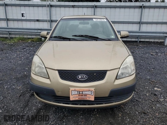 2009 Kia Rio LX with VIN KNADE223096485561, listed as a Copart auction lot 73412874 with 137,858 mi miles and Salvage Title. Bid and sale history available at DreamBid. Image 5.
