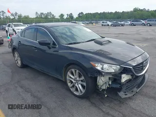2015 Mazda 6 i Touring with VIN JM1GJ1V50F1194196, listed as a IAAI auction lot 42053615 with 173,724 mi miles. Bid and sale history available at carsss.com. Image 1.