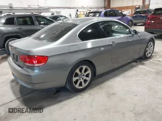 2007 BMW 3 Series 328xi with VIN WBAWC33517PC87084, listed as a IAAI auction lot 41611461 with 196,537 mi miles and . Bid and sale history available at DreamBid. Image 4.