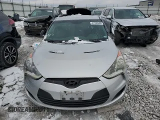 2015 Hyundai Veloster z VIN KMHTC6AD9FU236037, wystawiony jako Copart lot #43710405 z przebiegiem 130 254 mil mil oraz Czysty tytuł • Clean title. Historia ofert i sprzedaży dostępna na DreamBid. Obrazek 5.