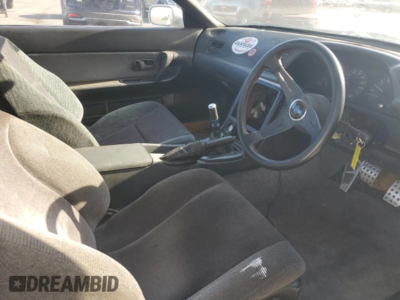 1989 Nissan Skyline z VIN HCR32034297, wystawiony jako Copart lot #79498714 z przebiegiem 125 635 mil mil oraz Czysty tytuł • Clean title. Historia ofert i sprzedaży dostępna na DreamBid. Obrazek 7.