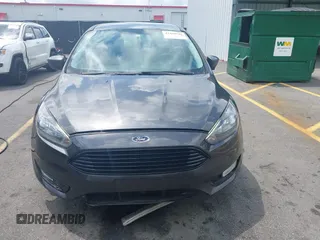 2018 Ford Focus SE with VIN 1FADP3FE2JL263954, listed as a IAAI auction lot 42480748 with 111,059 mi miles and . Bid and sale history available at DreamBid. Image 12.