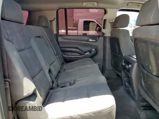 2015 Chevrolet Suburban LS z VIN 1GNSCHKC2FR707277, wystawiony jako Copart lot #59541635 z przebiegiem 198 876 mil mil oraz Szkoda całkowita • Salvage title. Historia ofert i sprzedaży dostępna na DreamBid. Obrazek 11.