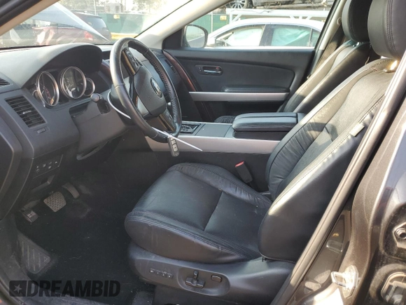 2015 Mazda CX-9 Grand Touring with VIN JM3TB3DV2F0453812, listed as a Copart auction lot 54445115 with 176,067 mi miles and Salvage title. Bid and sale history available at DreamBid. Image 7.
