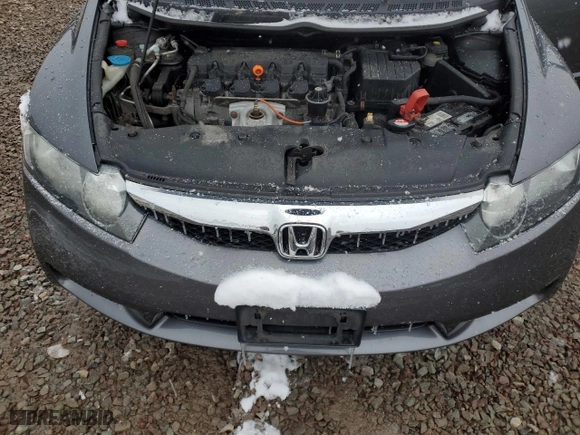 2010 Honda Civic Sdn LX with VIN 2HGFA1F50AH560941, listed as a Copart auction lot 51591825 with 131,489 mi miles and Salvage Title. Bid and sale history available at carsss.com. Image 11.