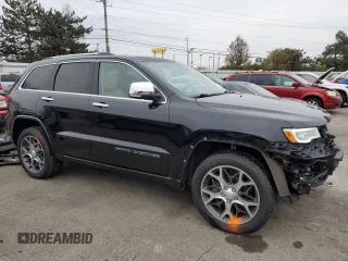 2019 Jeep Grand Cherokee High Altitude with VIN 1C4RJFCG9KC687917, listed as a Copart auction lot 82657114 with 75,004 mi miles and Salvage Title. Bid and sale history available at carsss.com. Image 4.