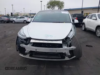 2023 Tesla Model Y Long Range z VIN 7SAYGDEE5PA063097, wystawiony jako IAAI lot #42171871 z przebiegiem Nie podano mil oraz . Historia ofert i sprzedaży dostępna na DreamBid. Obrazek 13.