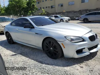 2013 BMW 6 Series 650i with VIN WBAYM9C59DDW20408, listed as a Copart auction lot 73585214 with 143,605 mi miles and Clean Title. Bid and sale history available at carsss.com. Image 4.