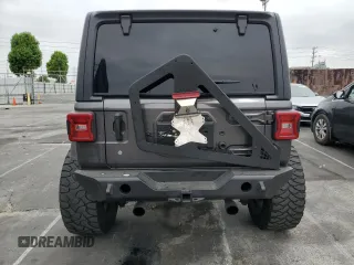 2019 Jeep Wrangler Unlimited Sport S with VIN 1C4HJXDG5KW535115, listed as a Copart auction lot 58404545 with 95,491 mi miles and Salvage title. Bid and sale history available at DreamBid. Image 6.