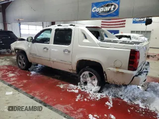 2012 Chevrolet Avalanche LTZ with VIN 3GNTKGE74CG233554, listed as a Copart auction lot 84366554 with 220,440 mi miles and Salvage Title. Bid and sale history available at carsss.com. Image 2.