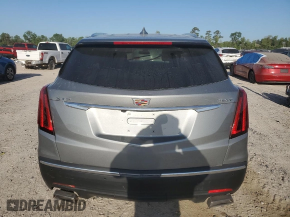 2023 Cadillac XT5 FWD Luxury z VIN 1GYKNAR49PZ174591, wystawiony jako Copart lot #52144985 z przebiegiem 20 005 mil mil oraz Szkoda całkowita • Salvage title. Historia ofert i sprzedaży dostępna na DreamBid. Obrazek 6.