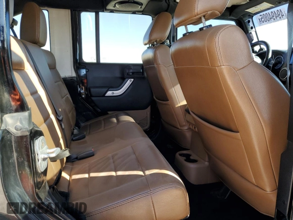2012 Jeep Wrangler Unlimited Rubicon z VIN 1C4HJWFG9CL105047, wystawiony jako Copart lot #49494005 z przebiegiem 132 591 mil mil oraz Szkoda całkowita • Salvage title. Historia ofert i sprzedaży dostępna na DreamBid. Obrazek 10.