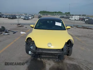 2013 Volkswagen Beetle with VIN 3VWHX7AT0DM603661, listed as a IAAI auction lot 42464030 with 95,159 mi miles and . Bid and sale history available at DreamBid. Image 13.