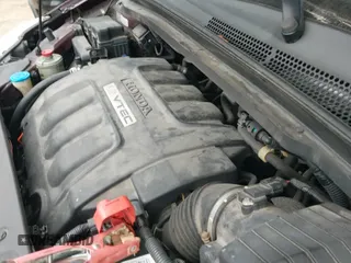 2007 Honda Odyssey EX z VIN 5FNRL38447B113341, wystawiony jako IAAI lot #43097399 z przebiegiem 185 701 mil mil oraz . Historia ofert i sprzedaży dostępna na DreamBid. Obrazek 20.