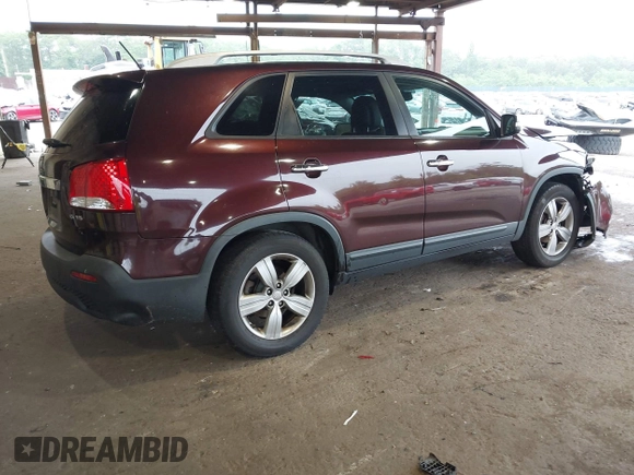 2012 Kia Sorento EX z VIN 5XYKU4A25CG304508, wystawiony jako IAAI lot #42461847 z przebiegiem 20 016 mil mil oraz . Historia ofert i sprzedaży dostępna na DreamBid. Obrazek 4.