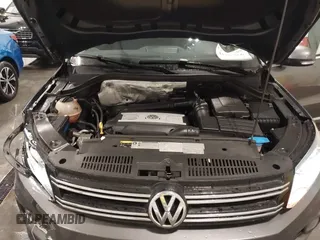 2016 Volkswagen Tiguan SE z VIN WVGBV7AX3GW507850, wystawiony jako IAAI lot #41303866 z przebiegiem 97 989 mil mil oraz . Historia ofert i sprzedaży dostępna na DreamBid. Obrazek 10.