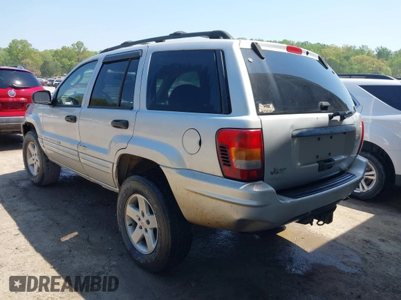 2004 Jeep Grand Cherokee Laredo with VIN 1J4GW48S74C260968, listed as a IAAI auction lot 42050628 with 192,602 mi miles. Bid and sale history available at carsss.com. Image 3.