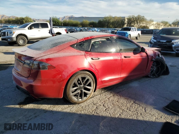 2021 Tesla Model S Plaid z VIN 5YJSA1E65MF435922, wystawiony jako Copart lot #77417854 z przebiegiem Nie podano mil oraz Szkoda całkowita • Salvage title. Historia ofert i sprzedaży dostępna na DreamBid. Obrazek 3.