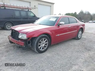 2006 Chrysler 300 C with VIN 2C3LA63H26H421354, listed as a IAAI auction lot 41706454 with 113,647 mi miles. Bid and sale history available at carsss.com. Image 2.