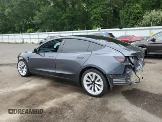 2023 Tesla Model 3 with VIN 5YJ3E1EA1PF678225, listed as a Copart auction lot 62634945 with 24,932 mi miles and Salvage title. Bid and sale history available at DreamBid. Image 2.