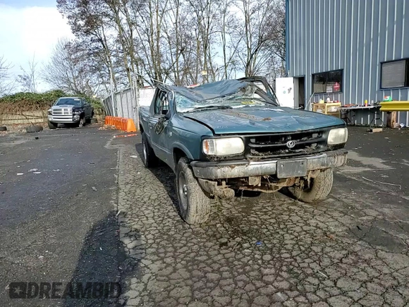 1994 Mazda B-Series Truck LE z VIN 4F4DR17X5RTN10704, wystawiony jako Copart lot #87230804 z przebiegiem 227 476 mil mil oraz Szkoda całkowita • Salvage title. Historia ofert i sprzedaży dostępna na DreamBid. Obrazek 11.