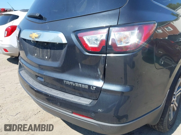 2015 Chevrolet Traverse LT z VIN 1GNKRGKD1FJ229238, wystawiony jako IAAI lot #42543288 z przebiegiem 285 667 mil mil oraz . Historia ofert i sprzedaży dostępna na DreamBid. Obrazek 6.