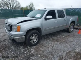 2013 GMC Sierra 1500 SLT with VIN 3GTP2WE74DG224066, listed as a IAAI auction lot 41990545 with 169,296 mi miles. Bid and sale history available at carsss.com. Image 2.