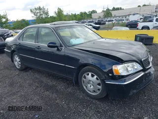 2004 Acura RL w/Navigation System with VIN JH4KA96624C003779, listed as a IAAI auction lot 39542033 with 80,018 mi miles. Bid and sale history available at carsss.com. Image 1.