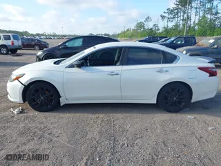 2017 Nissan Altima 2.5 SR with VIN 1N4AL3AP4HC231332, listed as a IAAI auction lot 41966946 with 151,015 mi miles. Bid and sale history available at carsss.com. Image 13.