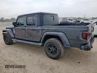 2021 Jeep Gladiator Willys с VIN 1C6HJTAG9ML606731, выставлен на аукционе Copart как лот 59873205 с пробегом 84 811 миль миль и Списание • Salvage title. История ставок и продаж доступна на DreamBid. Изображение 2.