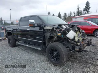 2018 GMC Sierra 2500HD SLT with VIN 1GT12TEY4JF203731, listed as a IAAI auction lot 41858306 with 86,931 mi miles. Bid and sale history available at carsss.com. Image 14.
