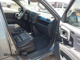 2006 Honda Ridgeline RTL with VIN 2HJYK16546H543552, listed as a IAAI auction lot 42187885 with 268,017 mi miles. Bid and sale history available at carsss.com. Image 5.