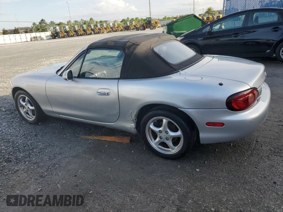 2002 Mazda MX-5 Miata Cloth with VIN JM1NB353420220801, listed as a Copart auction lot 61808645 with 116,451 mi miles and Salvage title. Bid and sale history available at DreamBid. Image 2.