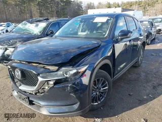 2021 Mazda CX-5 Touring with VIN JM3KFACM8M0399314, listed as a IAAI auction lot 41677939 with 40,617 mi miles. Bid and sale history available at carsss.com. Image 17.