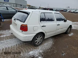 1997 Volkswagen Golf z VIN 3VWFA81H5VM008980, wystawiony jako Copart lot #45336405 z przebiegiem 119 529 mil mil oraz Szkoda całkowita • Salvage title. Historia ofert i sprzedaży dostępna na DreamBid. Obrazek 3.
