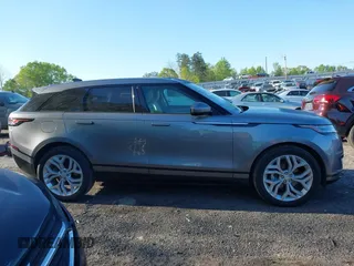 2020 Land Rover Range Rover Velar S z VIN SALYB2EXXLA295307, wystawiony jako IAAI lot #41971330 z przebiegiem 12 192 mil mil oraz . Historia ofert i sprzedaży dostępna na DreamBid. Obrazek 13.