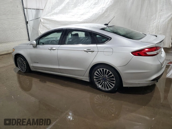 2017 Ford Fusion Hybrid Titanium with VIN 3FA6P0RU7HR383920, listed as a Copart auction lot 56320585 with 20,446 mi miles and Non repairable. Bid and sale history available at DreamBid. Image 2.