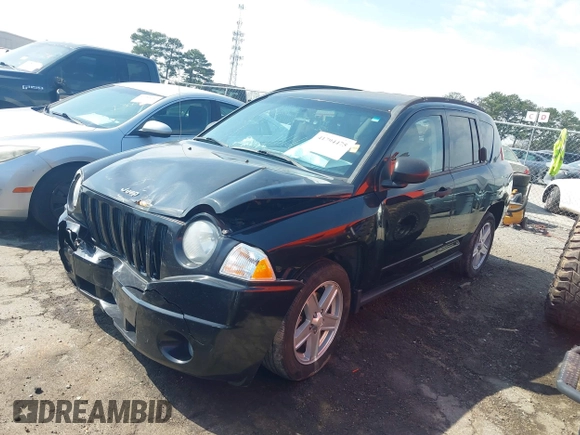 2008 Jeep Compass Sport with VIN 1J8FT47W68D711699, listed as a IAAI auction lot 41794475 with 182,700 mi miles. Bid and sale history available at carsss.com. Image 18.