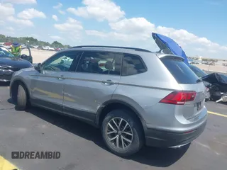 2021 Volkswagen Tiguan S with VIN 3VV1B7AX7MM117954, listed as a IAAI auction lot 42300223 with 45,587 mi miles and . Bid and sale history available at DreamBid. Image 3.