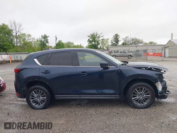 2017 Mazda CX-5 Touring z VIN JM3KFBCL4H0156571, wystawiony jako IAAI lot #42183562 z przebiegiem 135 595 mil mil oraz . Historia ofert i sprzedaży dostępna na DreamBid. Obrazek 14.